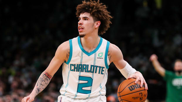 Charlotte Hornets guard LaMelo Ball (2) dribbles down the court during the first half against the Boston Celtics.