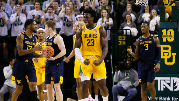 Jan 31, 2022; Waco, Texas, USA; Baylor Bears forward Jonathan Tchamwa Tchatchoua (23) reacts after a turn over by the West Virginia Mountaineers during the second half at Ferrell Center. Mandatory Credit: Raymond Carlin III-USA TODAY Sports