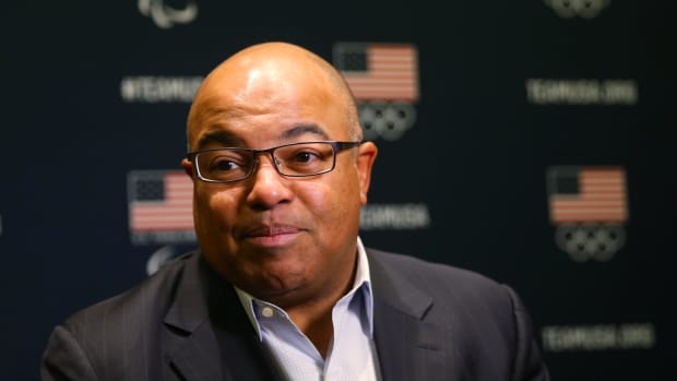 Mike Tirico talks at the Olympics.
