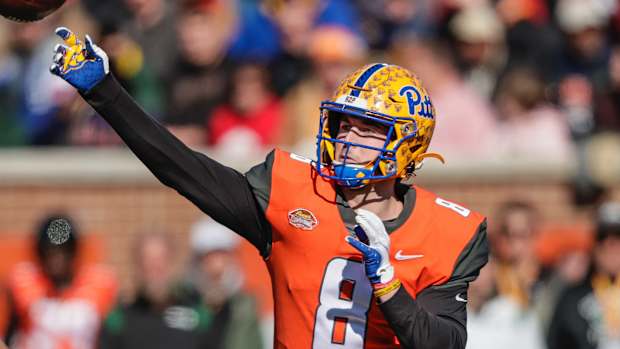 National Team quarterback Kenny Pickett, of Pittsburgh, throws a pass during the first half of an NCAA Senior Bowl college football game, Saturday, Feb. 5, 2022, in Mobile, Ala.