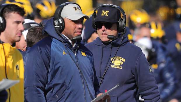 Josh Gattis coaching for Michigan.