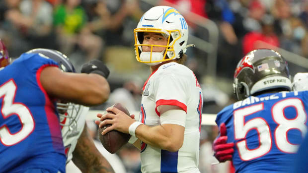 Justin Herbert eyes a receiver during the 2022 Pro Bowl.