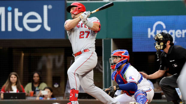 Angels star Mike Trout swings at a pitch.