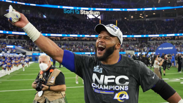 Jan 30, 2022; Inglewood, California, USA; Los Angeles Rams defensive end Aaron Donald celebrates after defeating the San Francisco 49ers in the NFC Championship Game at SoFi Stadium. Mandatory Credit: Kirby Lee-USA TODAY Sports