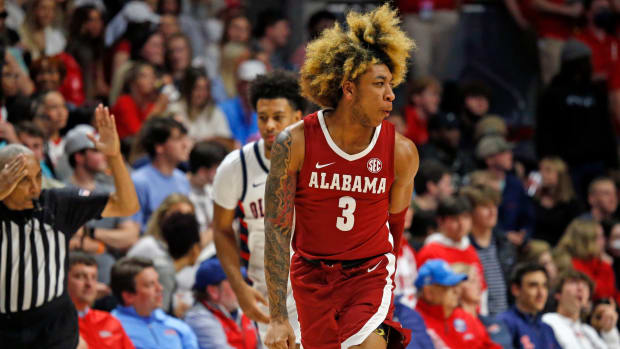 Alabama Crimson Tide guard JD Davison (3) reacts after a three point basket during the second half against the Mississippi Rebels at The Sandy and John Black Pavilion at Ole Miss.