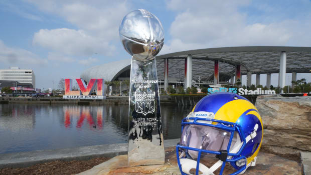 Feb 1, 2022; Inglewood, CA, USA; A Los Angeles Rams helmet and Vince Lombardi trophy are seen at SoFi Stadium. The Rams will play the Cincinnati Bengals in Super Bowl LVI on Feb. 13, 2022. Mandatory Credit: Kirby Lee-USA TODAY