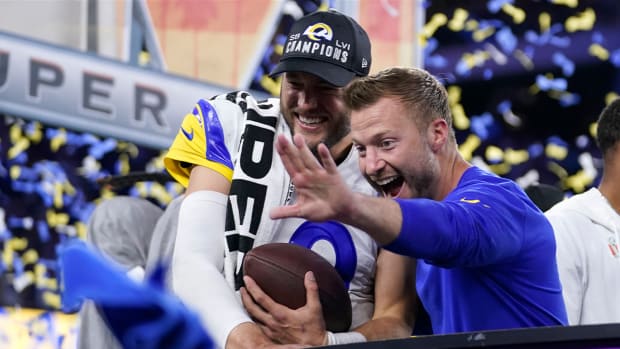 Los Angeles Rams quarterback Matthew Stafford, left, and head coach Sean McVay celebrate after the Rams defeated the Cincinnati Bengals in the Super Bowl.