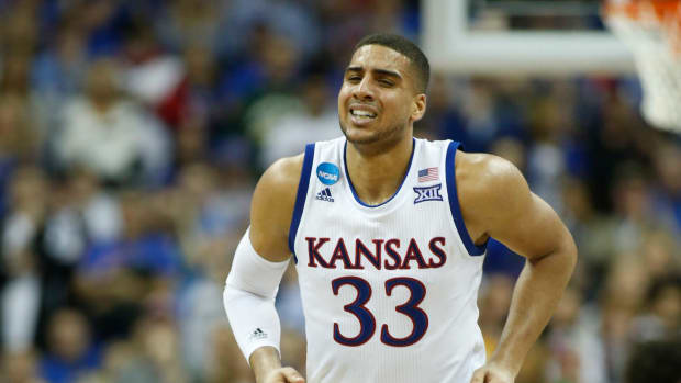Mar 25, 2017; Kansas City, MO, USA; Kansas Jayhawks forward Landen Lucas (33) reacts during the second half against the Oregon Ducks in the finals of the Midwest Regional of the 2017 NCAA Tournament at Sprint Center. Mandatory Credit: Jay Biggerstaff-USA TODAY Sports