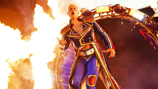 Cody Rhodes makes his entrance, surrounded by flames