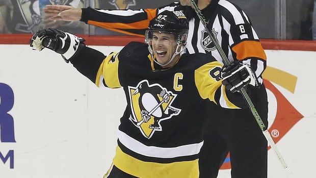 Pittsburgh Penguins center Sidney Crosby (87) reacts after scoring his 500th career NHL goal against the Philadelphia Flyers during the first period at PPG Paints Arena.