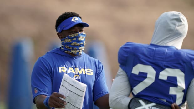 Aug 21, 2020; Thousand Oaks, CA, USA; Los Angeles Rams running back Thomas Brown (left) talks with running back Cam AKers (23) during training camp at Cal Lutheran University. Mandatory Credit: Kirby Lee-USA TODAY Sports