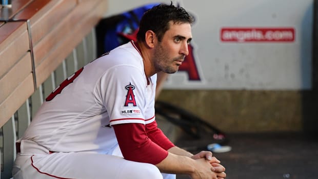 Los Angeles Angels starting pitcher Matt Harvey (33) sits in the dugout during the third inning against the Houston Astros.