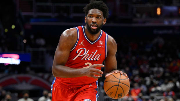 FILE - Philadelphia 76ers center Joel Embiid (21) in action during the second half of an NBA basketball game against the Washington Wizards, Monday, Jan. 17, 2022, in Washington. Embiid is putting his stamp on the 76ers season and has positioned himself into a true MVP candidate.