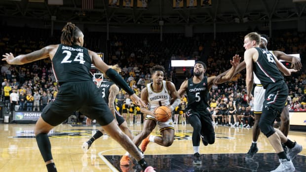 Jan 16, 2022; Wichita, Kansas, USA; Wichita State Shockers guard Tyson Etienne (1) looks for an opening to the basket during the game against the Cincinnati Bearcats at Charles Koch Arena. Mandatory Credit: William Purnell-USA TODAY Sports