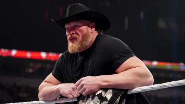 Brock Lesnar wearing a cowboy hat on Raw
