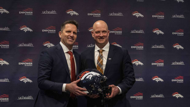 Denver Broncos GM George Paton with Nathaniel Hackett after announcing him as the club s head coach at a press conference at UC Health Training Center.