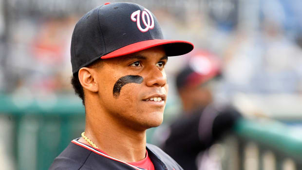 Nationals left fielder Juan Soto (22) in the dugout before the game against the Chicago Cubs at Nationals Park.