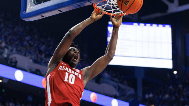Alabama Crimson Tide center Charles Bediako (10) dunks the ball during the first half against the Kentucky Wildcats at Rupp Arena at Central Bank Center.