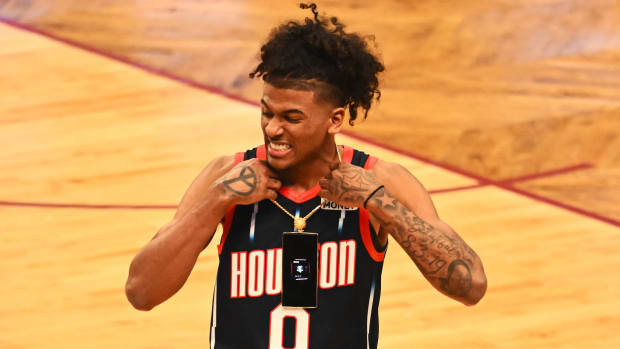 Jalen Green #0 of the Houston Rockets reacts after dunking the ball during the AT&T Slam Dunk Contest as part of the 2022 NBA All Star Weekend at Rocket Mortgage Fieldhouse on February 19, 2022 in Cleveland, Ohio.