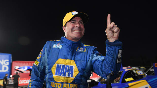 The second-winningest driver in NHRA Funny Car history, Ron Capps, flashes a very familiar pose after a recent win. He's not only starring on drag strips across America, he's also starring in a new video series, "Cue and A," which we're excited announce we will release every new edition right here at AutoRacingDigest.com. Videos courtesy Ron Capps. Photo courtesy NHRA.