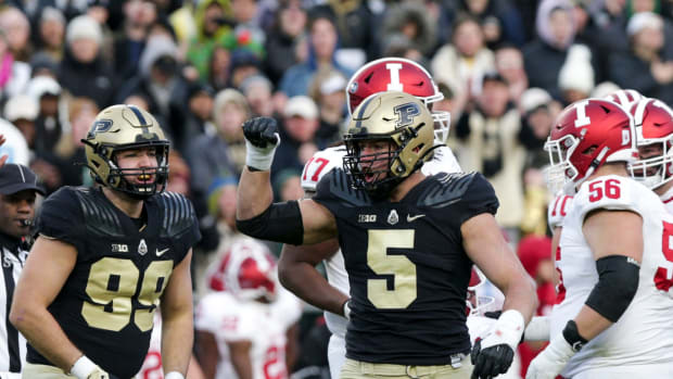 Purdue defensive end George Karlaftis (5) celebrates a stop during the second quarter of an NCAA college football game, Saturday, Nov. 27, 2021 at Ross-Ade Stadium in West Lafayette. Cfb Purdue Vs Indiana