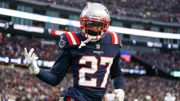 New England Patriots cornerback J.C. Jackson (27) reacts after intercepting a pass in the Tennessee Titans end zone.