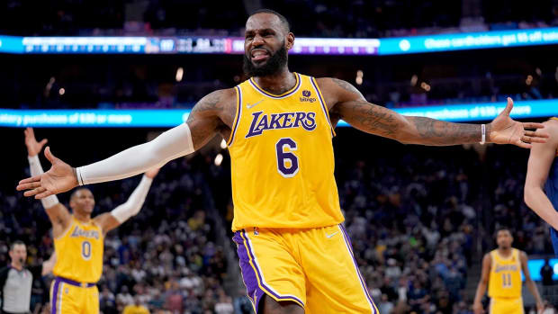 Los Angeles Lakers forward LeBron James (6) reacts after being fouled while shooting a three point shot against the Golden State Warriors.