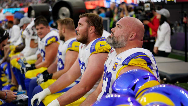 Feb 13, 2022; Inglewood, CA, USA; Los Angeles Rams offensive tackle Andrew Whitworth (77) and looks at the scoreboard as he faces his former team the Cincinnati Bengals during Super Bowl 56, Sunday, Feb. 13, 2022, at SoFi Stadium in Inglewood, Calif. Mandatory Credit: Sam Greene-USA TODAY Sports