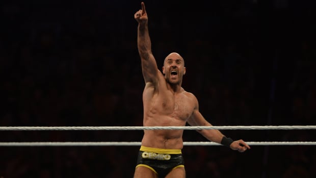 Apr 10, 2021; Tampa, Florida, USA; Cesaro (black/yellow trunks) reacts after pinning Seth Rollins (not pictured) during a singles match at WrestleMania 37 at Raymond James Stadium.