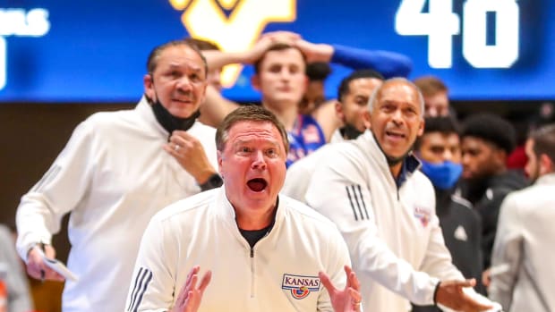 Feb 19, 2022; Morgantown, West Virginia, USA; Kansas Jayhawks head coach Bill Self reacts after a call during the second half against the West Virginia Mountaineers at WVU Coliseum. Mandatory Credit: Ben Queen-USA TODAY Sports