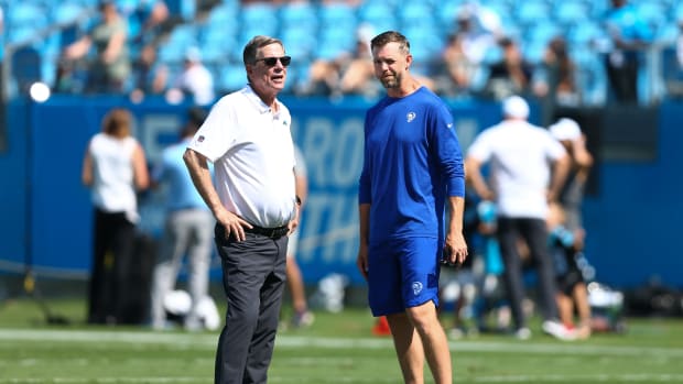 Sep 8, 2019; Charlotte, NC, USA; Carolina Panthers offensive coordinator Norv Turner (left) talks with Los Angeles Rams tight ends coach Wes Phillips prior to a game at Bank of America Stadium. Mandatory Credit: Jeremy Brevard-USA TODAY Sports
