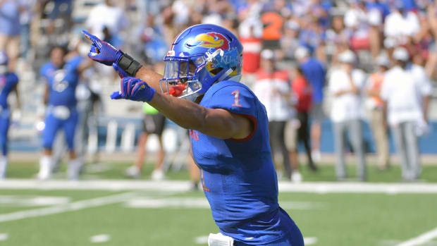 Sep 15, 2018; Lawrence, KS, USA; Kansas Jayhawks safety Bryce Torneden (1) celebrates after recovering a fumble during the first half against the Rutgers Scarlet Knights at Memorial Stadium. Mandatory Credit: Denny Medley-USA TODAY Sports
