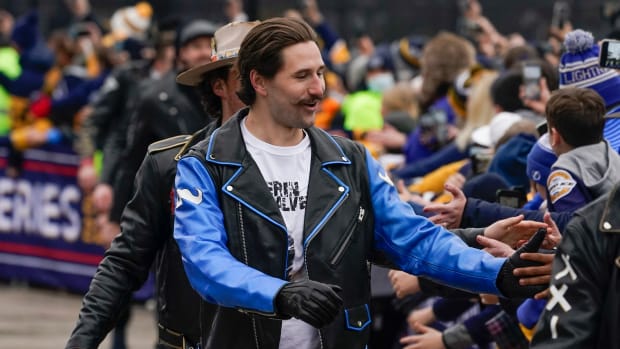Nashville Predators left wing Filip Forsberg greets fans as players arrive at Nissan Stadium before an NHL Stadium Series hockey game between the Predators and the Tampa Bay Lightning Saturday, Feb. 26, 2022, in Nashville, Tenn.