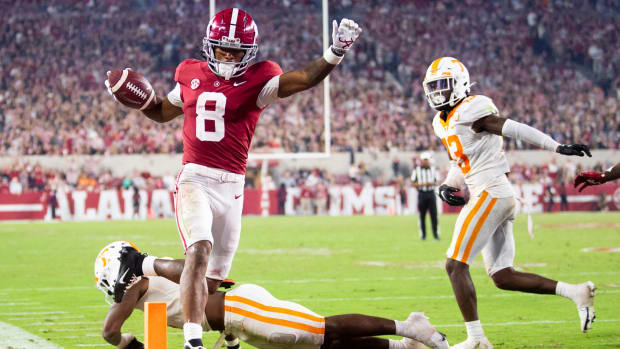 Alabama wide receiver John Metchie III (8) scores a touchdown during a football game between the Tennessee Volunteers and the Alabama Crimson Tide at Bryant-Denny Stadium in Tuscaloosa, Ala., on Saturday, Oct. 23, 2021. Kns Tennessee Alabama Football Bp
