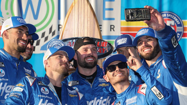 Kyle Larson celebrates with his team after winning Sunday in Fontana, California.