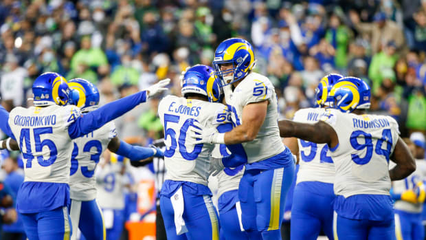 Oct 7, 2021; Seattle, Washington, USA; Los Angeles Rams linebacker Troy Reeder (51) and linebacker Ernest Jones (50) celebrate following a missed field goal by the Seattle Seahawks during the second quarter at Lumen Field. Mandatory Credit: Joe Nicholson-USA TODAY Sports
