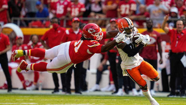 Sep 12, 2021; Kansas City, Missouri, USA; Cleveland Browns wide receiver Jarvis Landry (80) is tackled by Kansas City Chiefs nose tackle Derrick Nnadi (91) during the first half at GEHA Field at Arrowhead Stadium. Mandatory Credit: Jay Biggerstaff-USA TODAY Sports