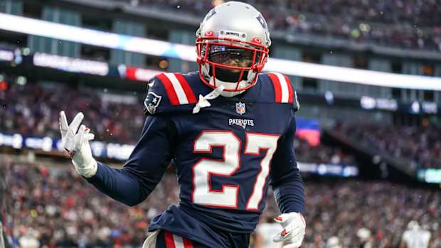Nov 28, 2021; Foxborough, Massachusetts, USA; New England Patriots cornerback J.C. Jackson (27) reacts after intercepting a pass in the Tennessee Titans end zone in the second half at Gillette Stadium.