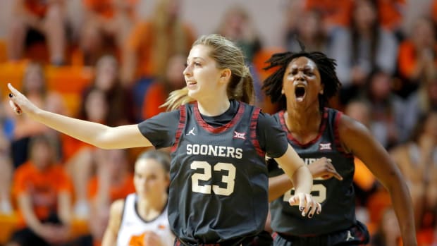 Oklahoma Sooners guard Kaley Perkins (23) and guard Madi Williams (25) celebrate during a women's Bedlam basketball game between the Oklahoma State University Cowgirls (OSU) and the University of Oklahoma Sooners (OU) at Gallagher-Iba Arena in Stillwater, Okla., Wednesday, March 2, 2022. Oklahoma won 79-76. Women S Bedlam Basketball