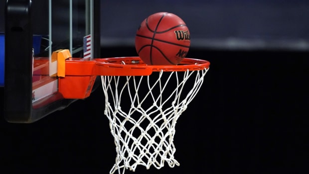 Mar 5, 2021; Las Vegas, NV, USA; A general view of a Wilson NCAA official basketball and rim and net during a Pac-12 Conference women's tournament semifinal between the Arizona Wildcats and the UCLA Bruins at Mandalay Bay Events Center. Mandatory Credit: Kirby Lee-USA TODAY Sports