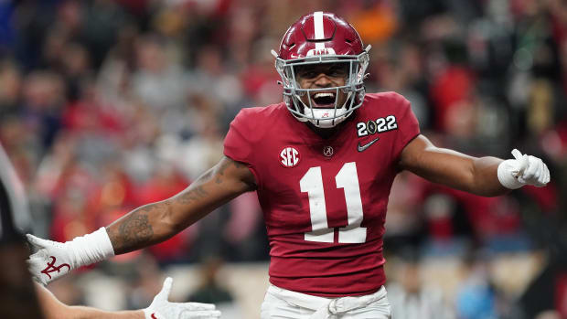Alabama wide receiver Traeshon Holden (11) celebrates after Alabama scored a touchdown against Georgia during the 2022 CFP college football national championship game at Lucas Oil Stadium.