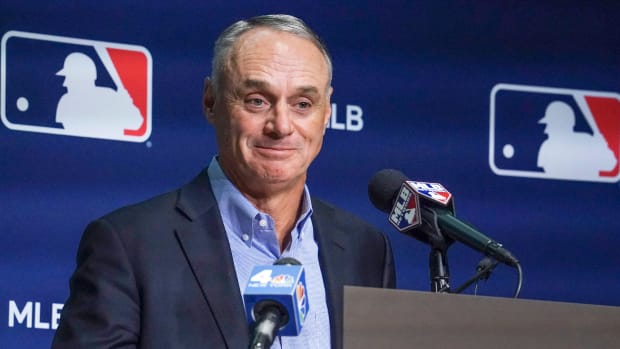 Baseball Commissioner Rob Manfred holds a news conference after baseball players and owners voted to approve a new labor agreement, Thursday March 10, 2022, in New York. “I am genuinely thrilled to say Major League Baseball is back and we’re going to play 162 games,” Manfred said. “I want to start by apologizing to our fans. I know the last few months have been difficult.”