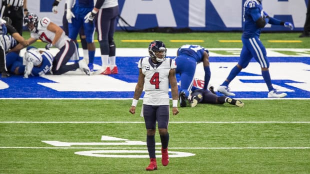 Houston Texans quarterback Deshaun Watson (4) reacts after a Texans fumble into the end zone to end the game against the Indianapolis Colts at Lucas Oil Stadium.