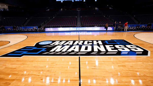 General view of the March Madness logo during practice the day before the start of the First Four of the 2022 NCAA Tournament at UD Arena.