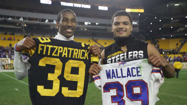 Buffalo Bills cornerback Levi Wallace (left) and Pittsburgh Steelers free safety Minkah Fitzpatrick (right) exchange jerseys after their 2019 game at Heinz Field. Buffalo won 17-10.