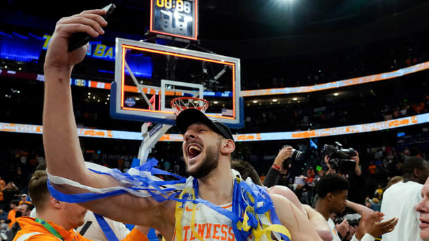 Tennessee forward Uros Plavsic (33) celebrates after the team defeated Texas A&M during an NCAA men’s college basketball Southeastern Conference tournament championship game Sunday, March 13, 2022, in Tampa, Fla.