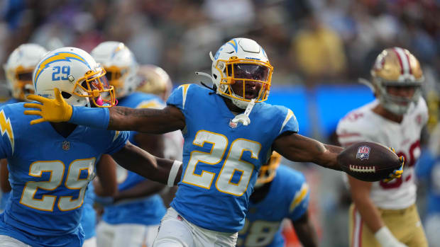 Aug 22, 2021; Inglewood, California, USA; Los Angeles Chargers cornerback Asante Samuel Jr. 26) celebrates with safety Talanoa Hufanga (29) after intercepting a pass in the first quarter against the San Francisco 49ers at SoFi Stadium. Mandatory Credit: Kirby Lee-USA TODAY Sports