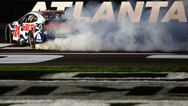 William Byron celebrates with a burnout after winning at Atlanta Motor Speedway earlier this year. (Photo by Sean Gardner/Getty Images)