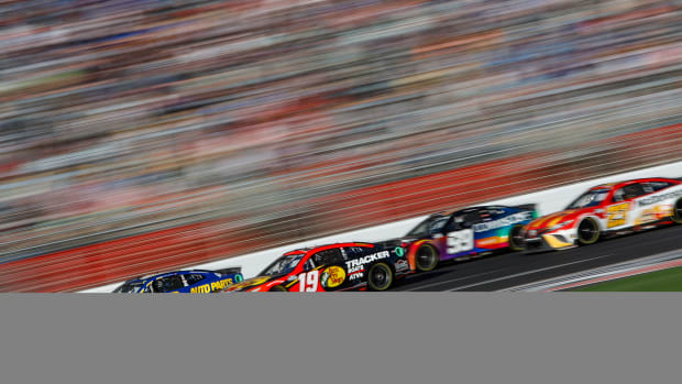 Chase Elliott and Martin Truex Jr. race during Sunday's Folds of Honor QuikTrip 500 at Atlanta Motor Speedway. (Photo by Sean Gardner/Getty Images)