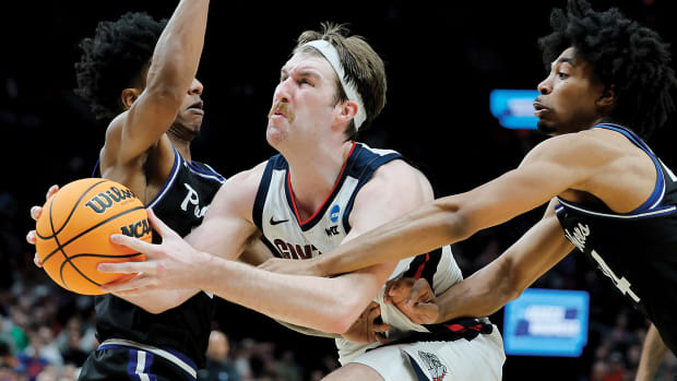 Gonzaga Bulldogs forward Drew Timme (2) shoots against Georgia State Panthers guard Kane Williams (12) and guard Collin Moore (24) in the second half during the first round of the 2022 NCAA Tournament.